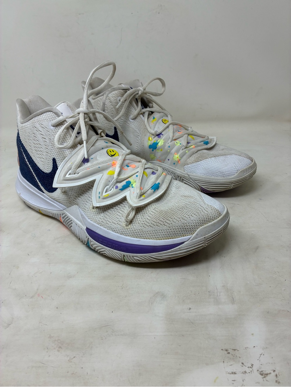 Nike White Basketball Sneakers with Navy Swoosh and Purple Midsole Accent